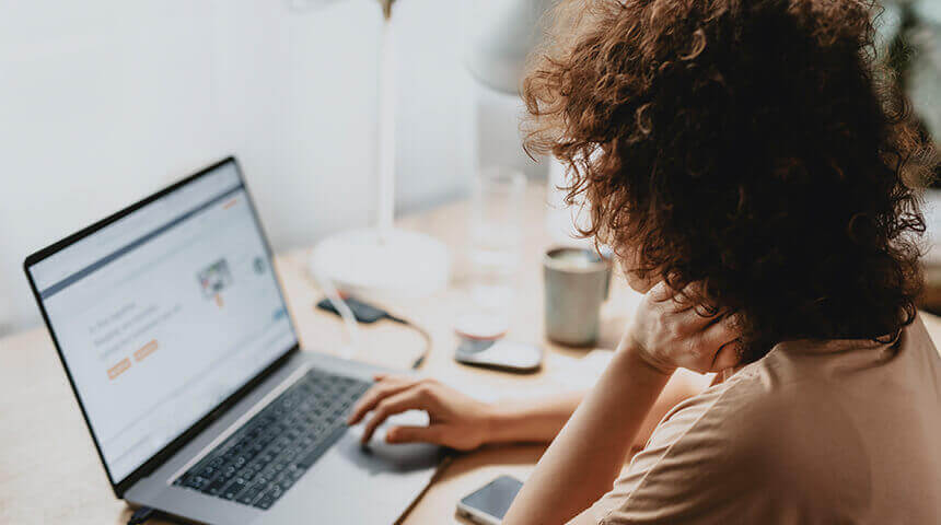 woman sitting at home watching