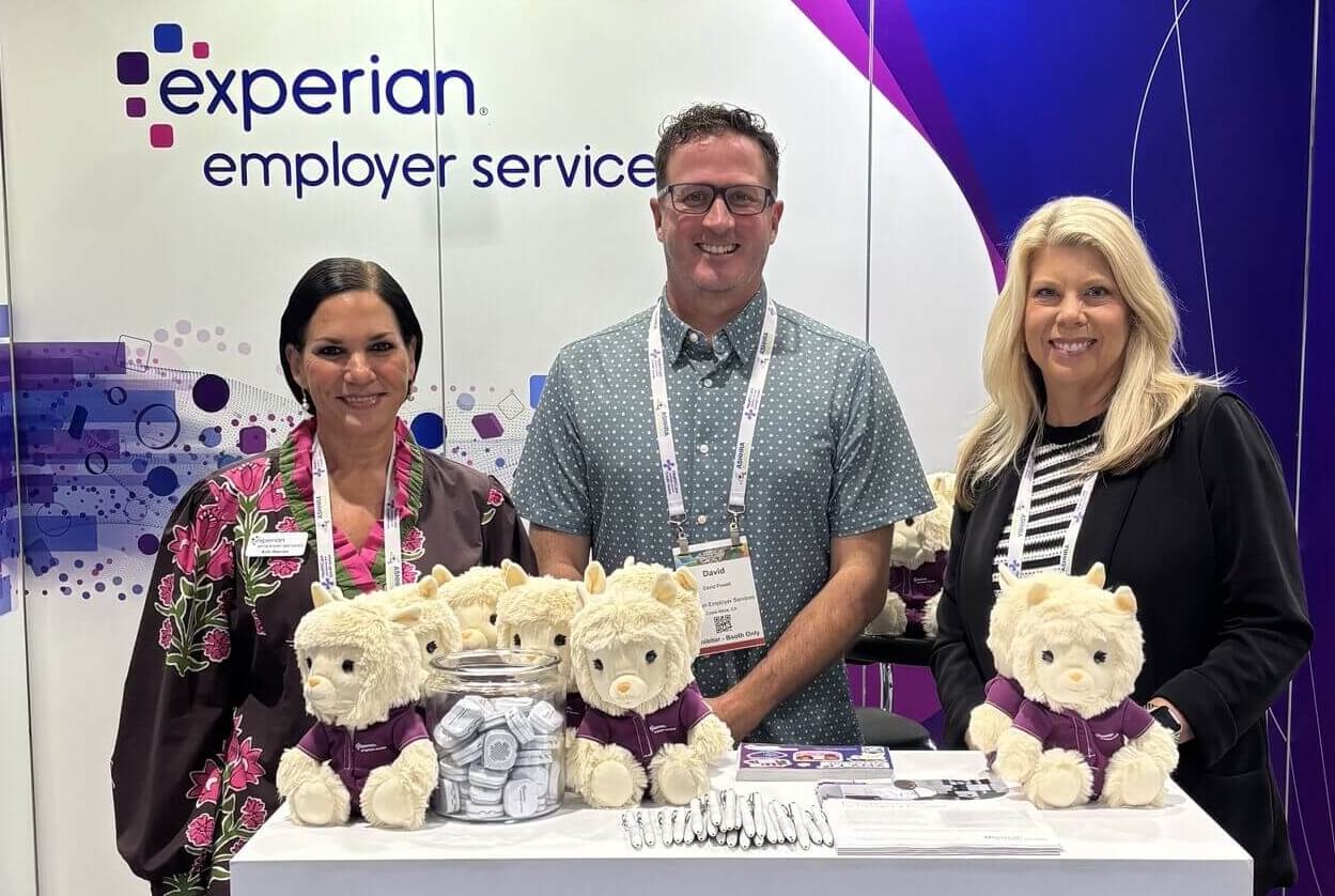 3 attendees are at a booth for employer services at ashhra